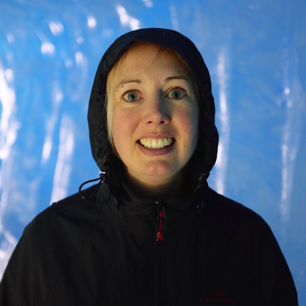 Sarah inside the Rhone Glacier ice cave tunnel.
